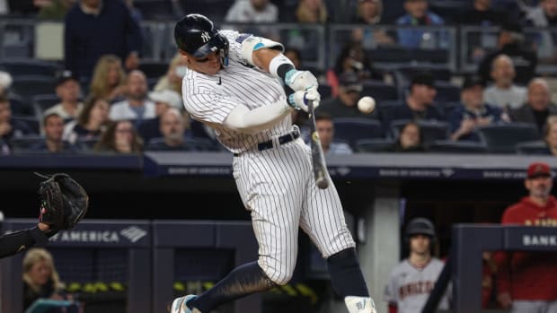 New York Yankees right fielder Aaron Judge (99) hits his third home run of the game during the seventh inning against the Arizona Diamondbacks at Yankee Stadium.